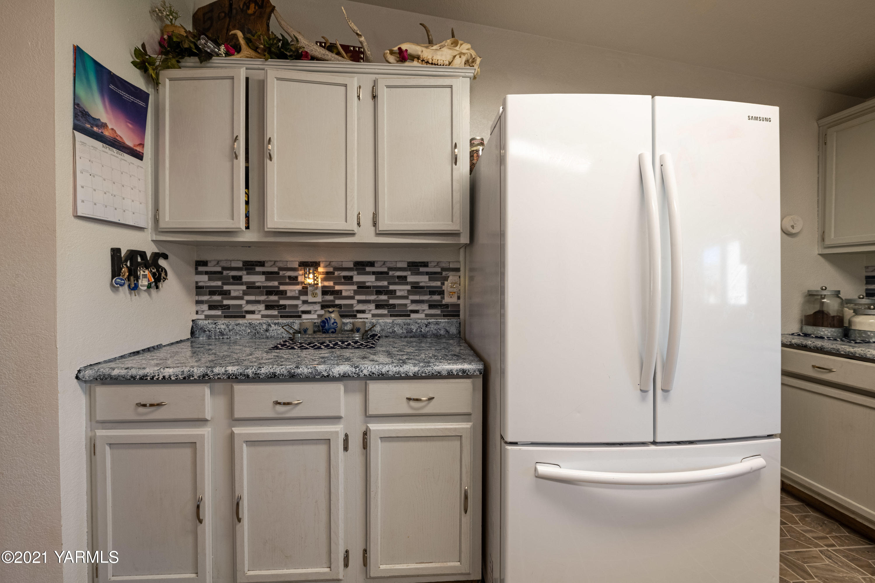 1222 Almo Road Yakima, WA 98901 - Photo 10 of 23 a bathroom with a granite countertop sink and a mirror