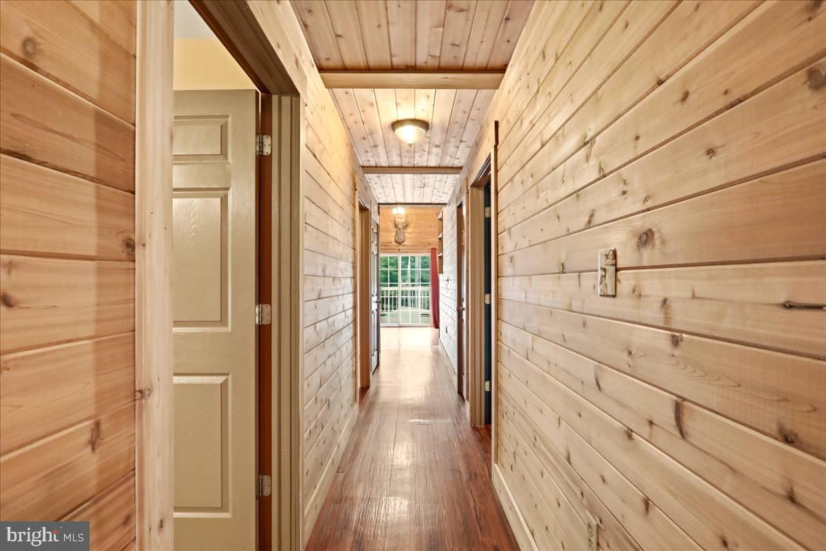 24105 Raven Rock Road Smithsburg, MD 21783 - Photo 13 of 51 Warm wooden hallway