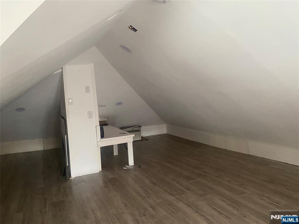 30 North Demarest Avenue Bergenfield, NJ 07621 - Photo 12 of 12 an empty room with wooden floor and windows