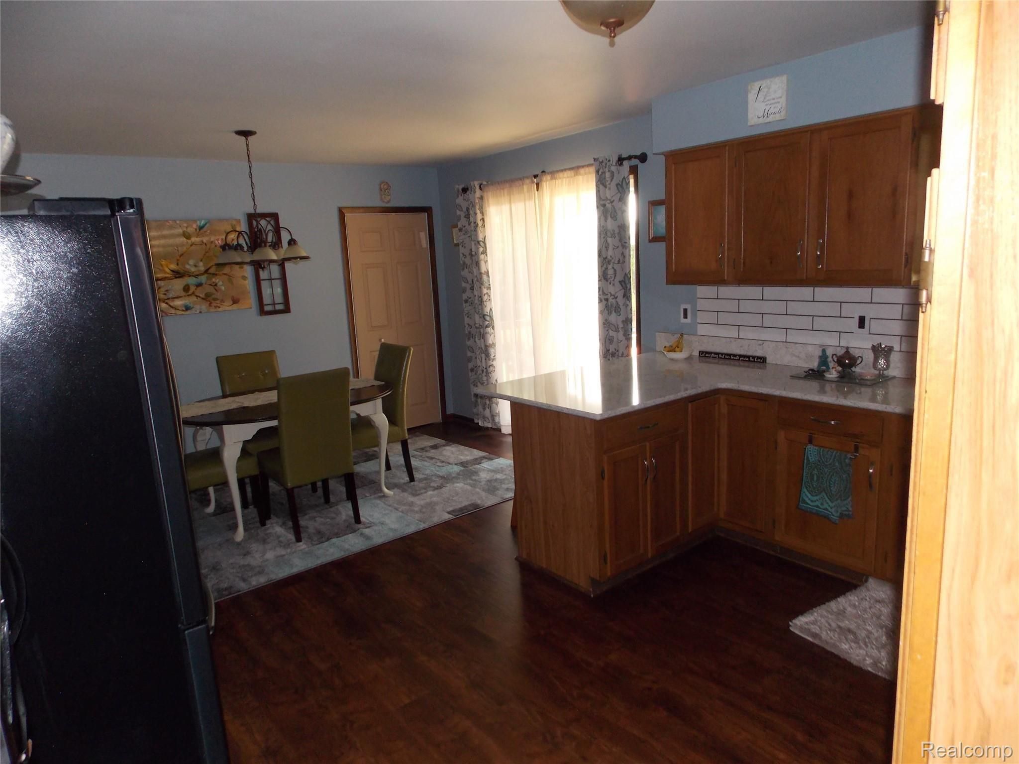 2371 King Road Lapeer, MI 48446 - Photo 8 of 23 You will enjoy carrying your groceries in from the attached 2 car garage, just a few steps and the task is done.