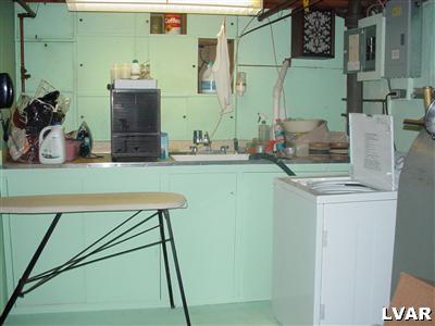 3135 Hilly Road Bethlehem, PA 18017 - Photo 15 of 20 Basement level has work area, built ins and laundry hookup.