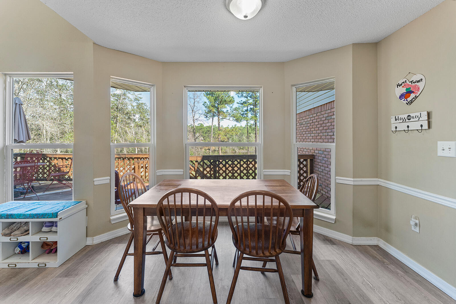 132 Wedgewood Lane Crestview, FL 32536 - Photo 11 of 67 a view of a dining room with furniture window and outside view