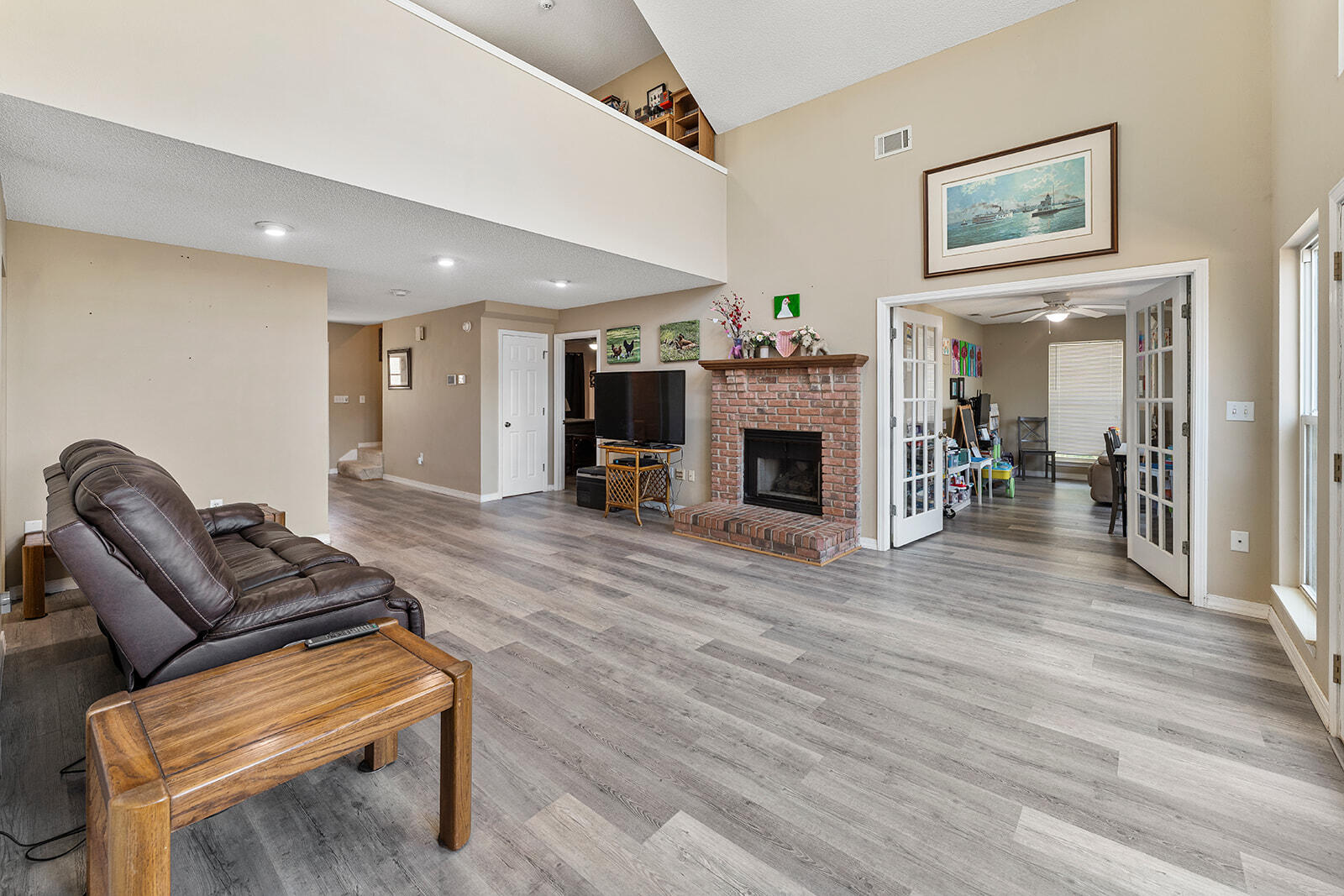 132 Wedgewood Lane Crestview, FL 32536 - Photo 14 of 67 a living room with furniture and a fireplace