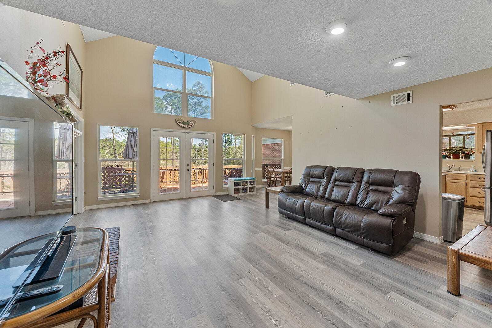 132 Wedgewood Lane Crestview, FL 32536 - Photo 16 of 67 a living room with furniture and wooden floor