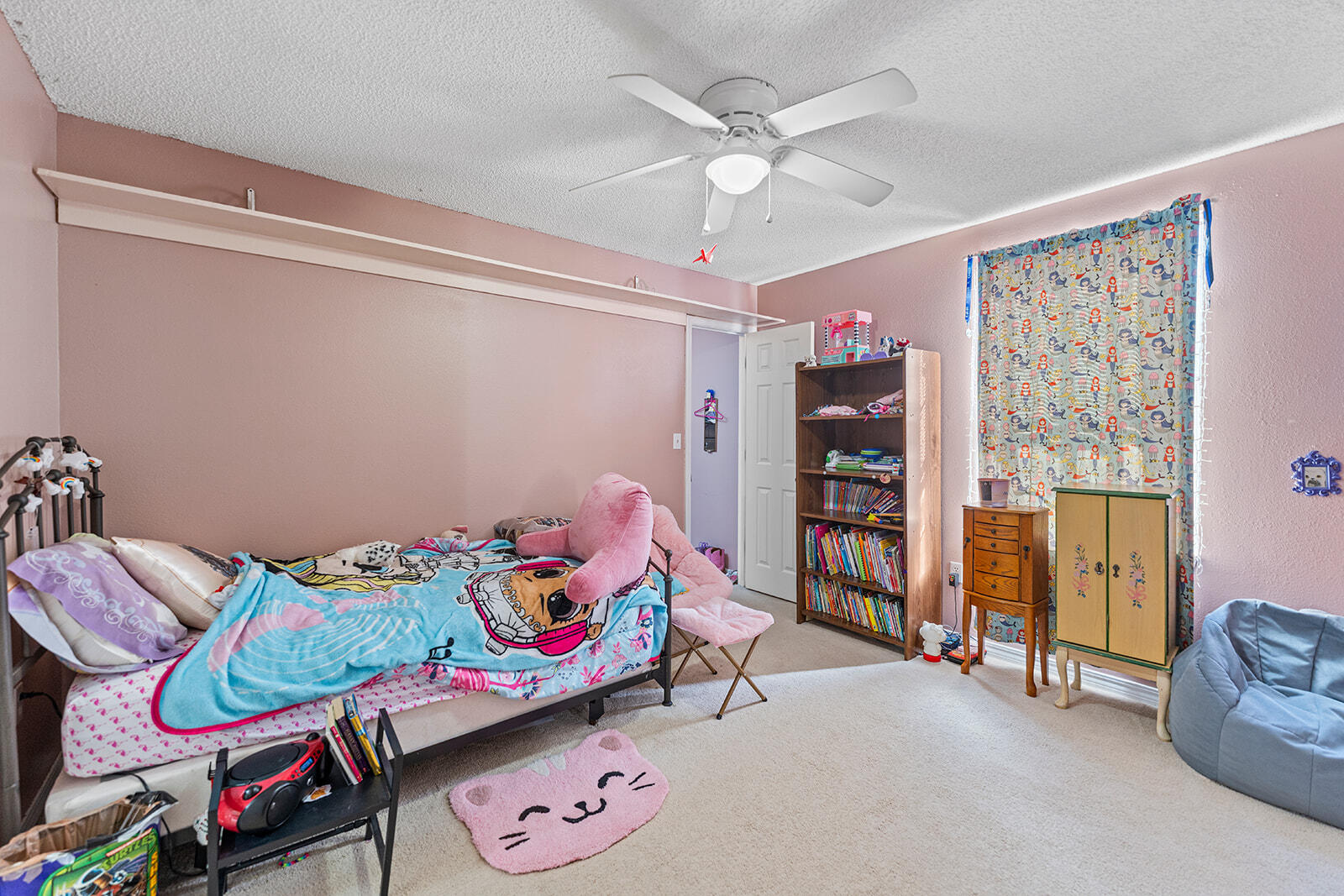 132 Wedgewood Lane Crestview, FL 32536 - Photo 17 of 67 a bedroom with a bed and a chandelier