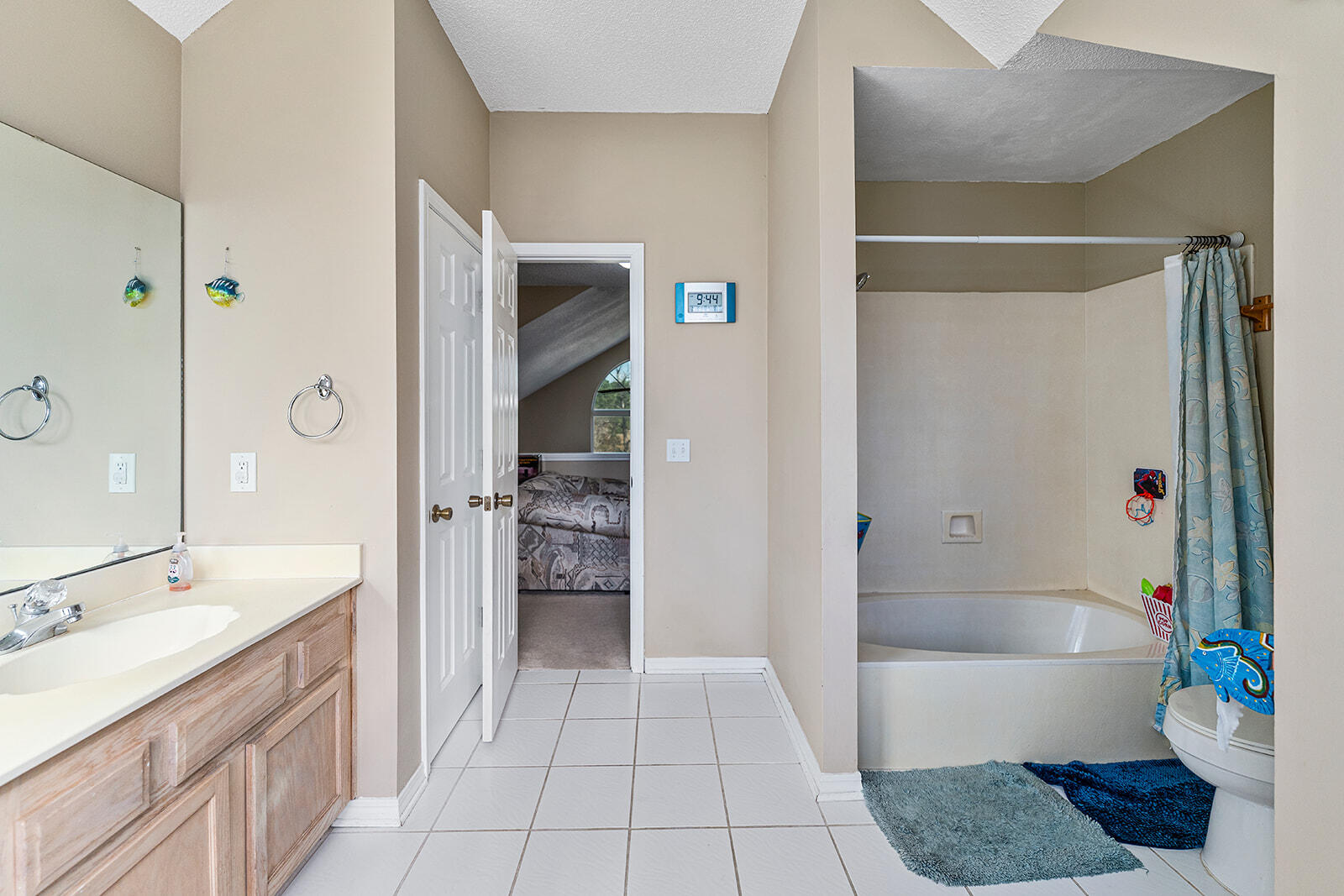 132 Wedgewood Lane Crestview, FL 32536 - Photo 20 of 67 a bathroom with a tub shower and sink