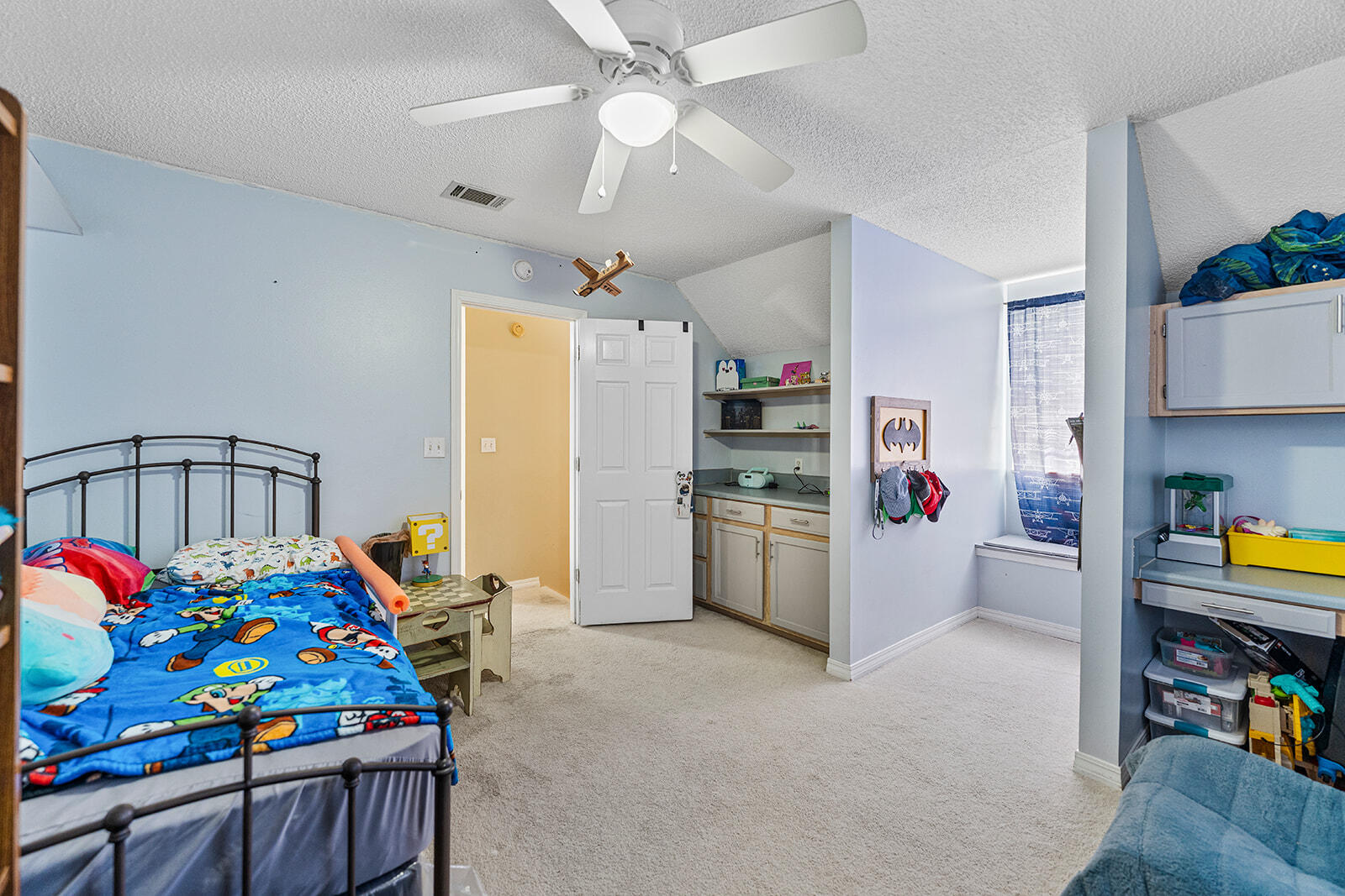 132 Wedgewood Lane Crestview, FL 32536 - Photo 22 of 67 a storage room with lots of furniture and toys