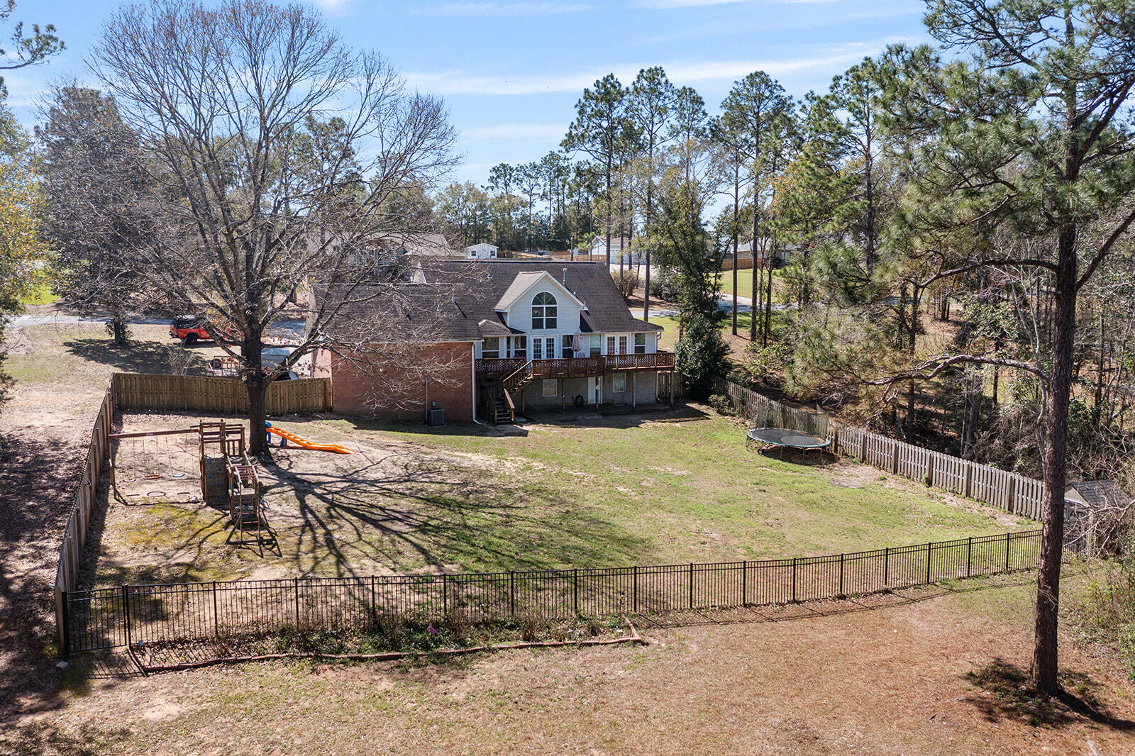 132 Wedgewood Lane Crestview, FL 32536 - Photo 57 of 67 a view of a yard in front of a house