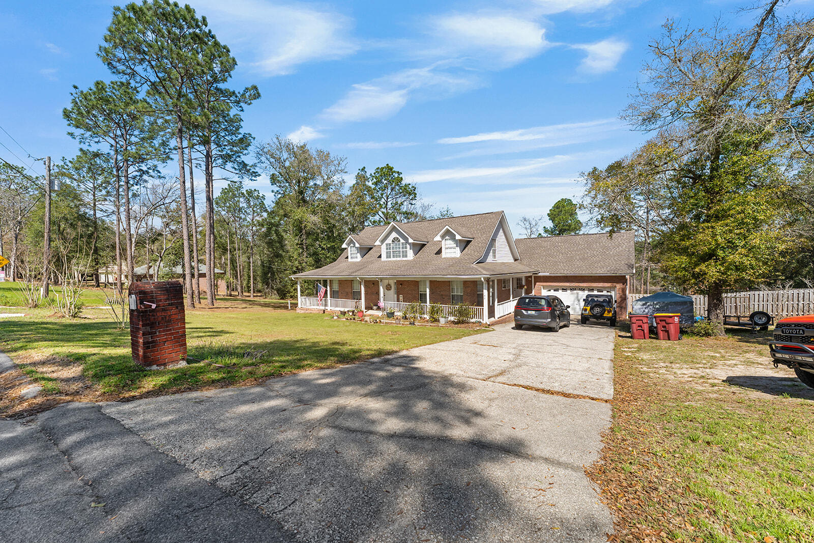 132 Wedgewood Lane Crestview, FL 32536 - Photo 6 of 67 a view of a house with a yard and large trees