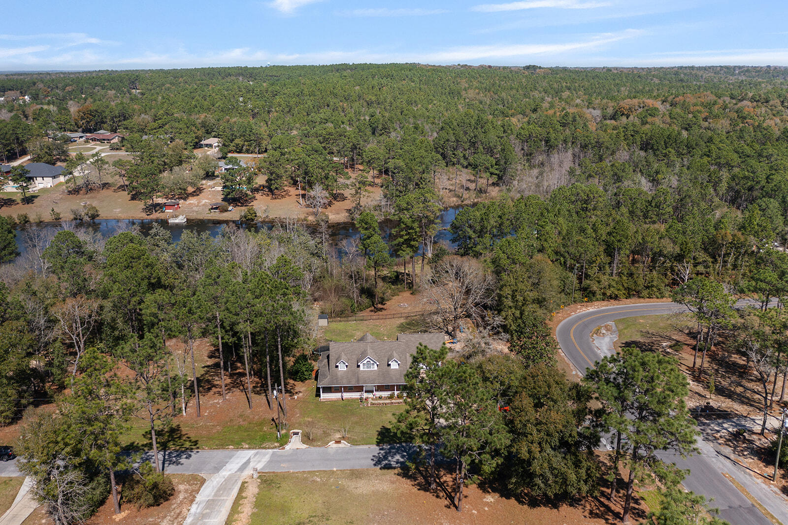 132 Wedgewood Lane Crestview, FL 32536 - Photo 62 of 67 a view of a city with lush green forest