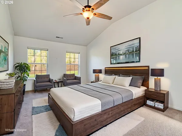 a bedroom with bed and window