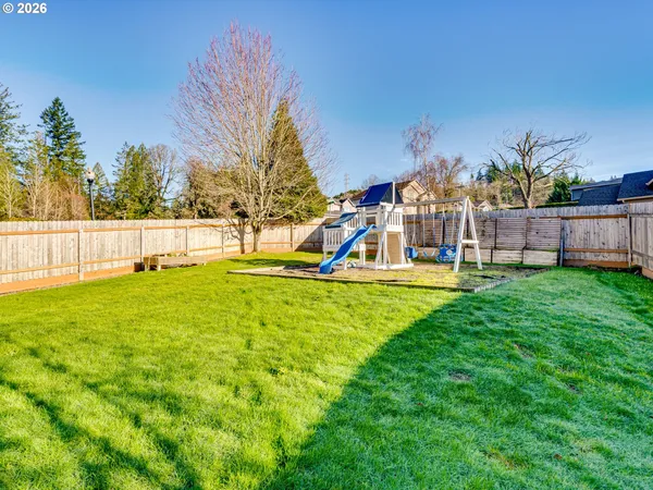 a view of a garden with a slide