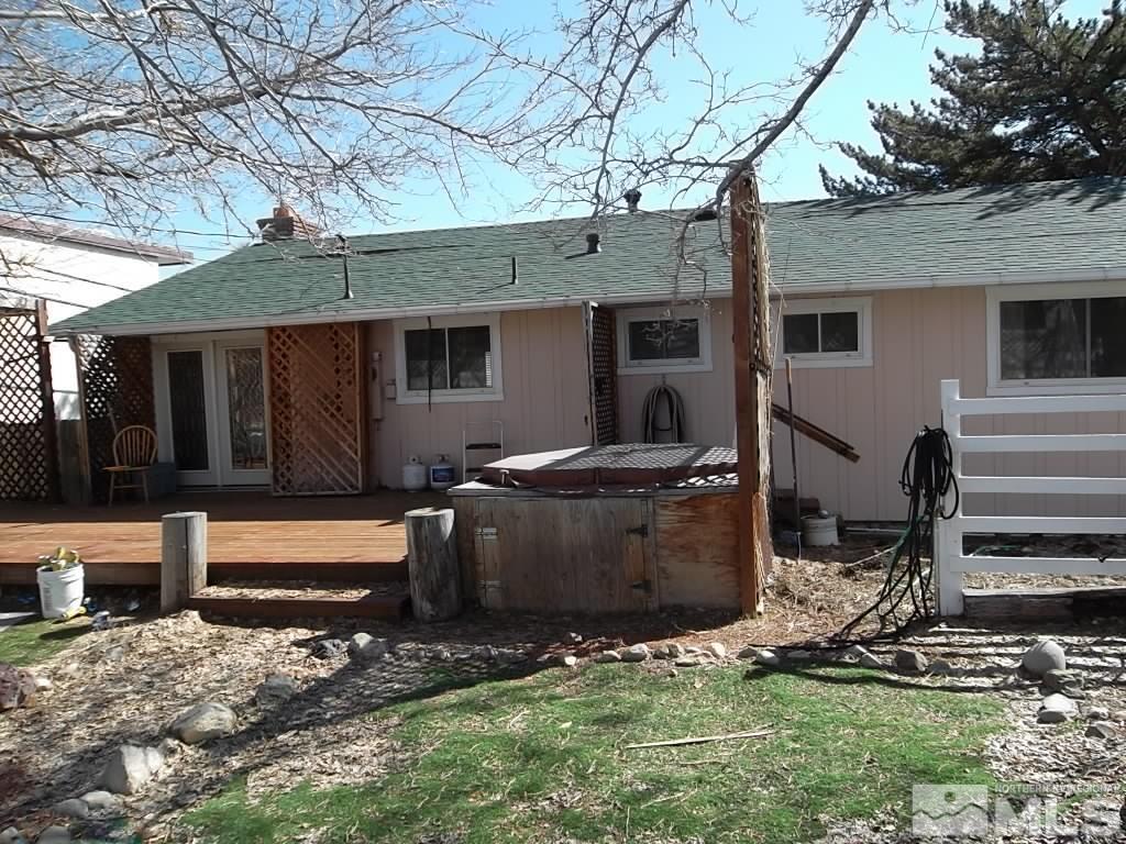 1575 Carlin Street Reno, NV 89503 - Photo 15 of 17 a view of a house with backyard and sitting area