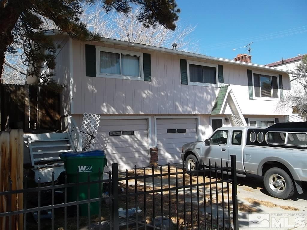 1575 Carlin Street Reno, NV 89503 - Photo 3 of 17 a front view of residential houses with outdoor space