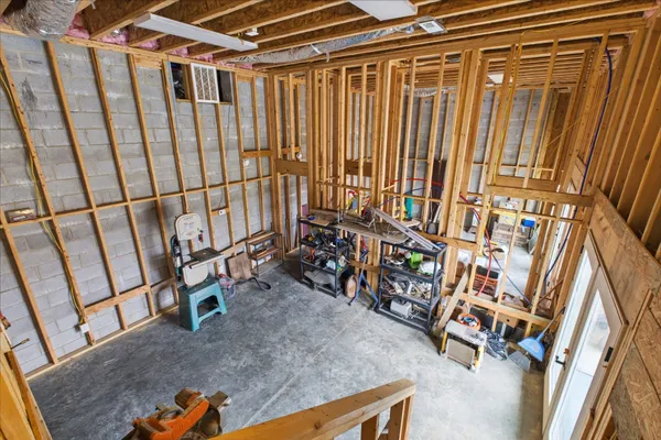 a view of a room with a tree in it