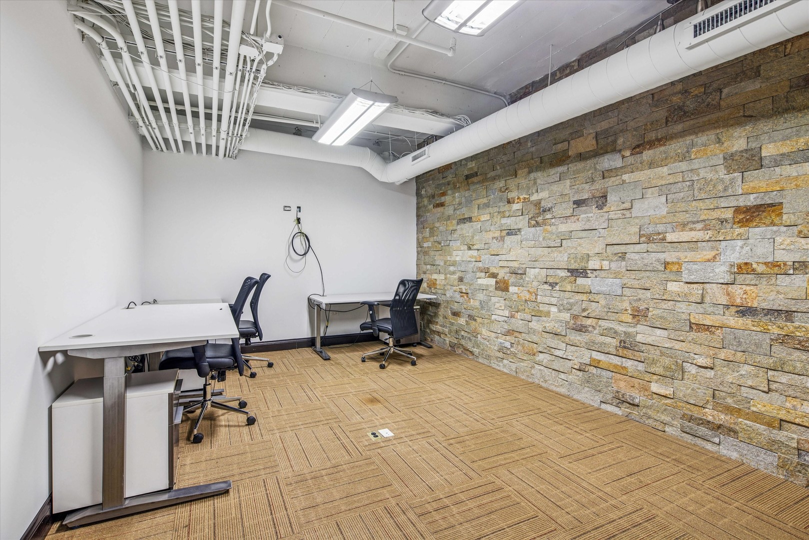 1327 West Washington Boulevard, Unit 105 Chicago, IL 60607 - Photo 5 of 16 a view of a room with gym equipment