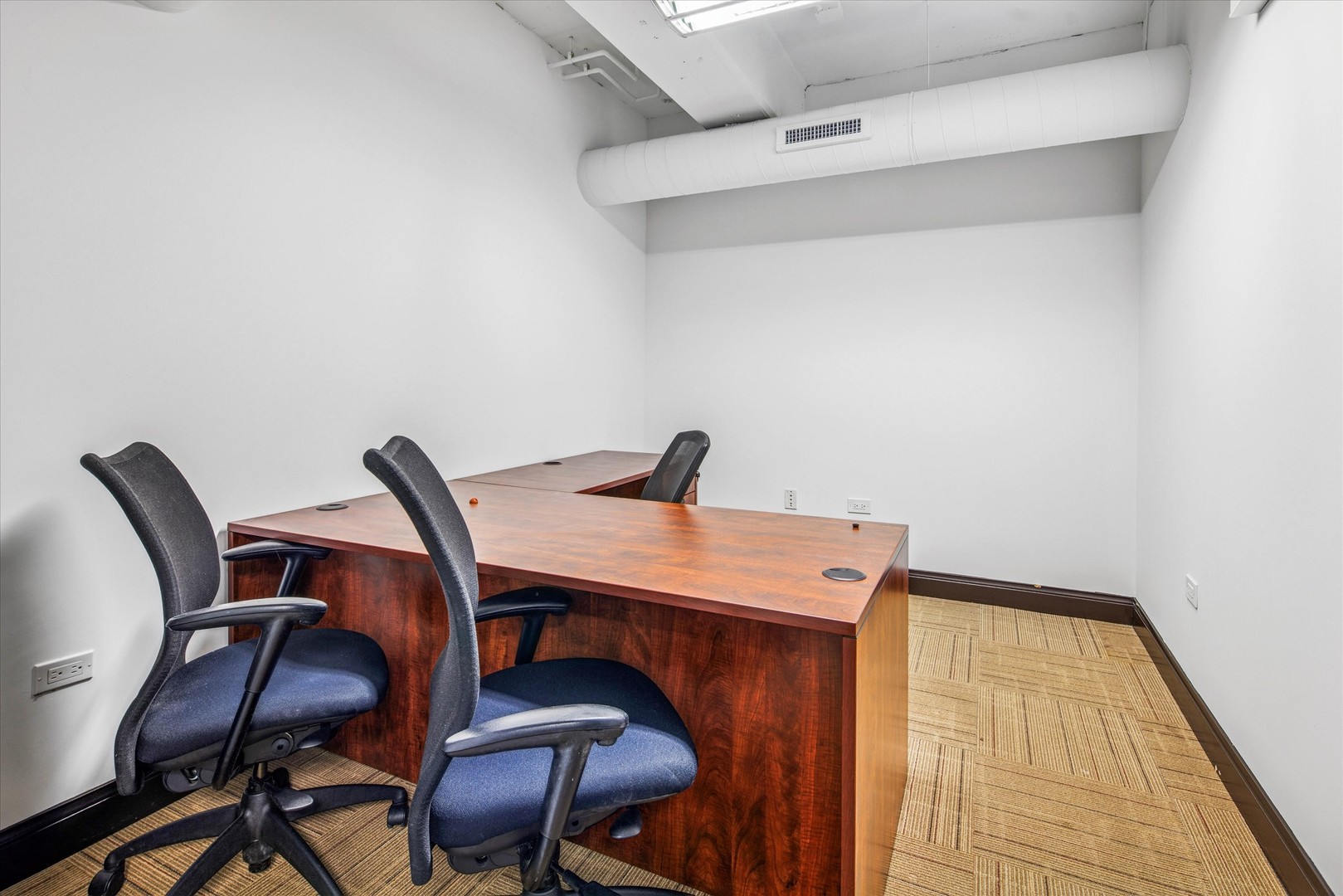 1327 West Washington Boulevard, Unit 105 Chicago, IL 60607 - Photo 7 of 16 a view of a workspace with furniture and wooden floor