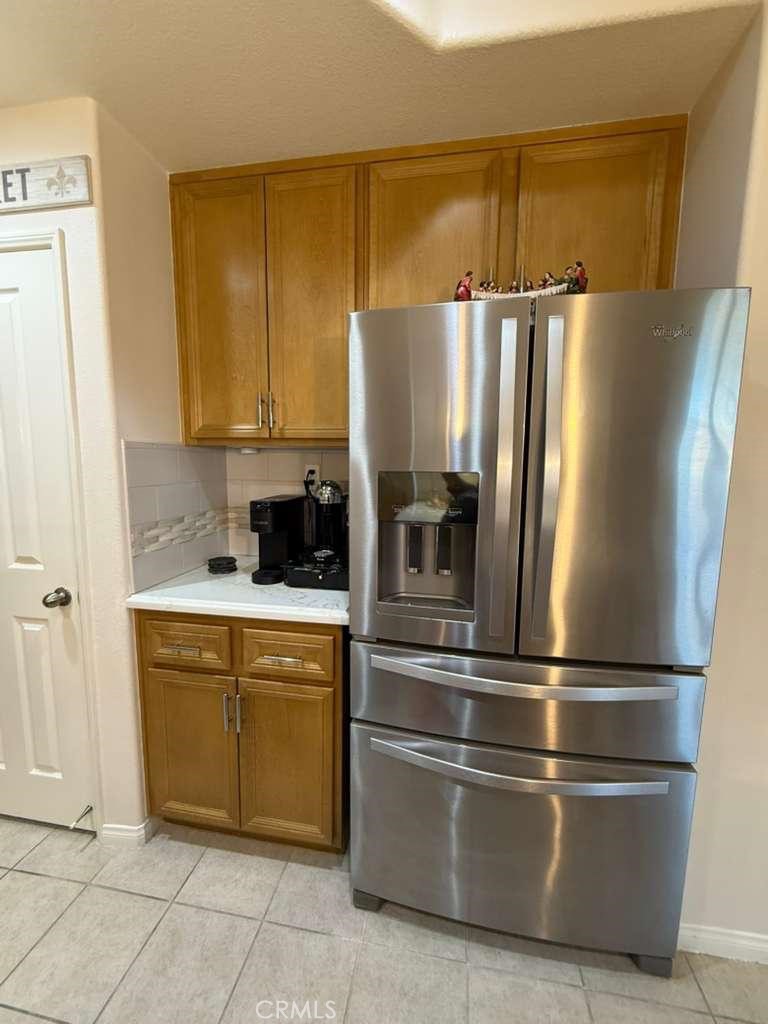 2931 Esperanza Way, Unit B Simi Valley, CA 93063 - Photo 17 of 49 a kitchen with stainless steel appliances granite countertop a refrigerator and a sink