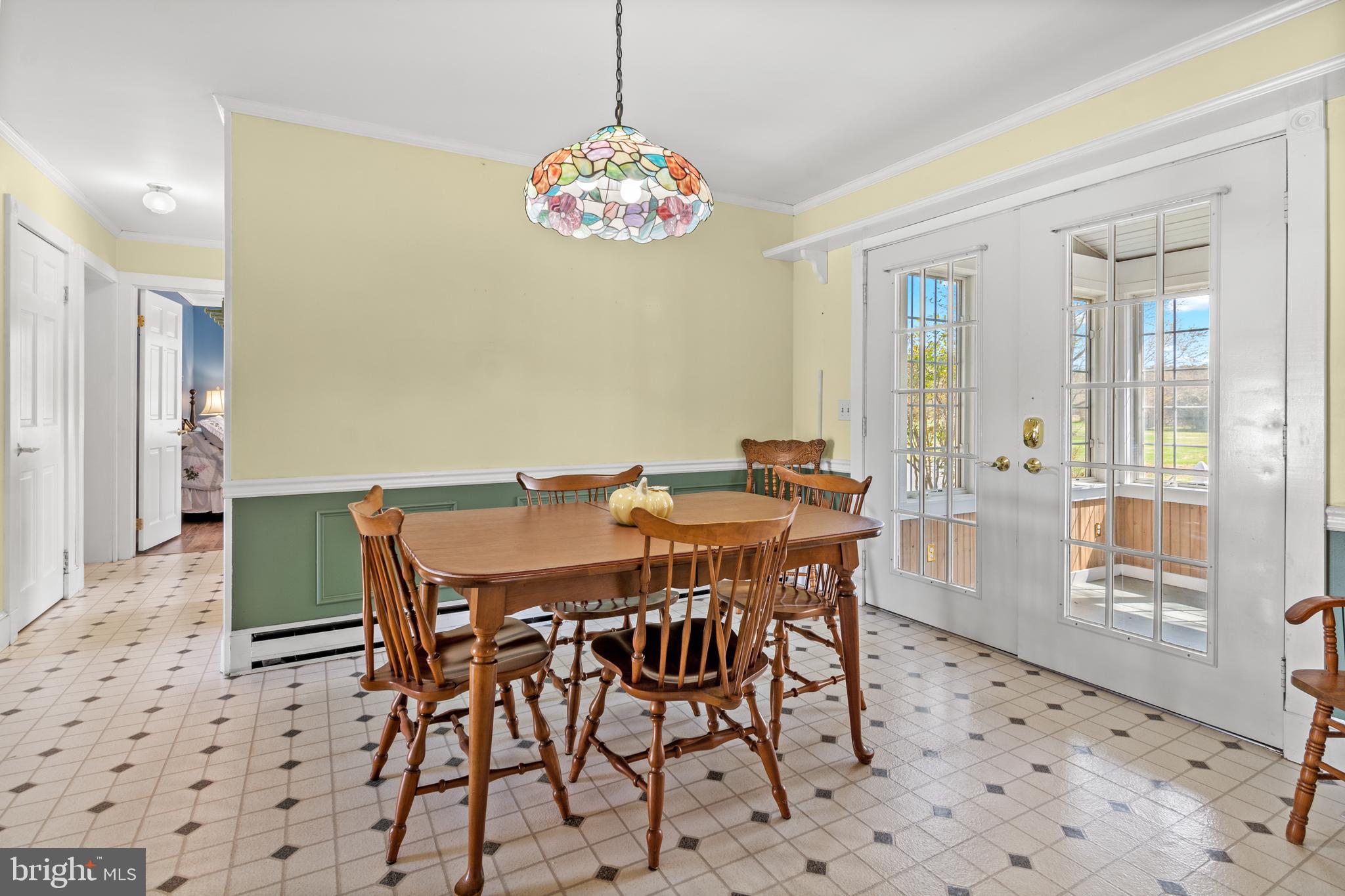 22539 Indian Point Road Bozman, MD 21612 - Photo 20 of 66 a view of a dining room with furniture and wooden floor