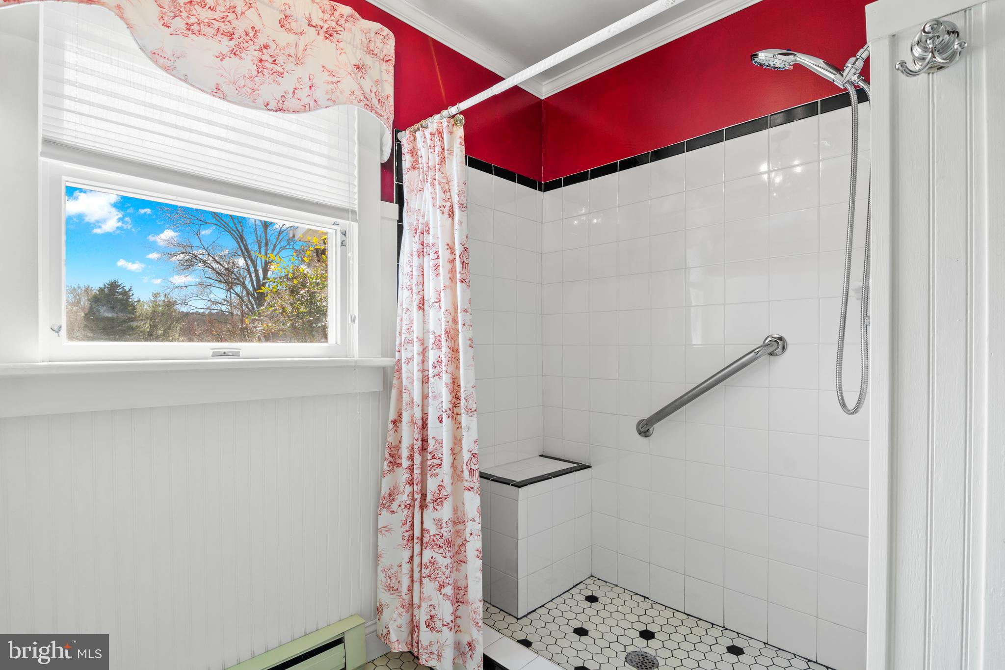22539 Indian Point Road Bozman, MD 21612 - Photo 23 of 66 a bathroom with a small white door and a shower