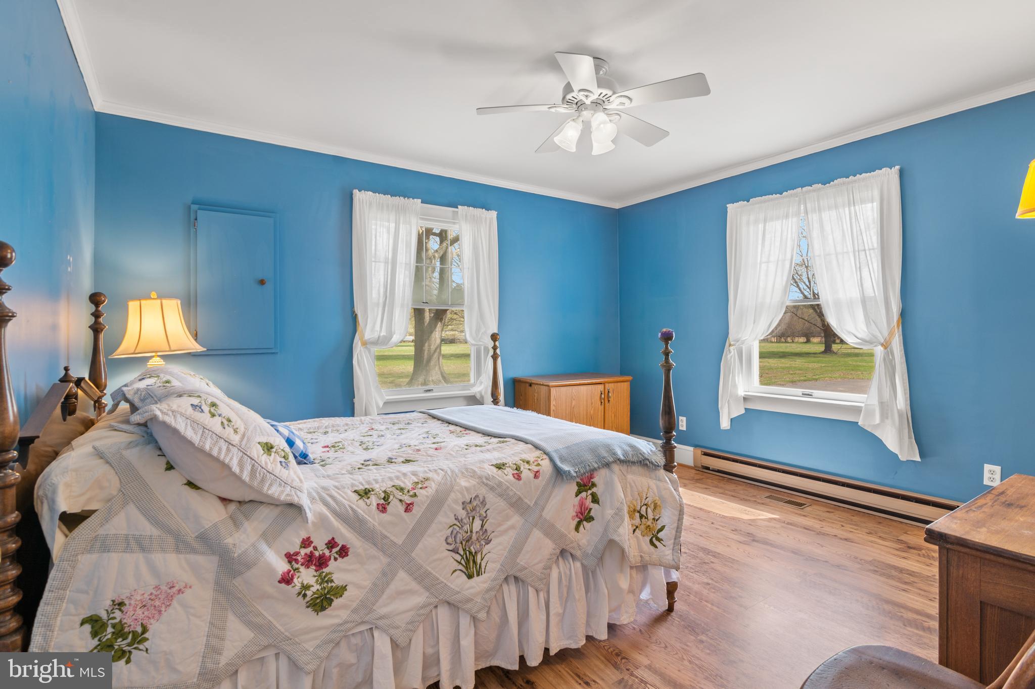 22539 Indian Point Road Bozman, MD 21612 - Photo 25 of 66 a bedroom with a bed and a window