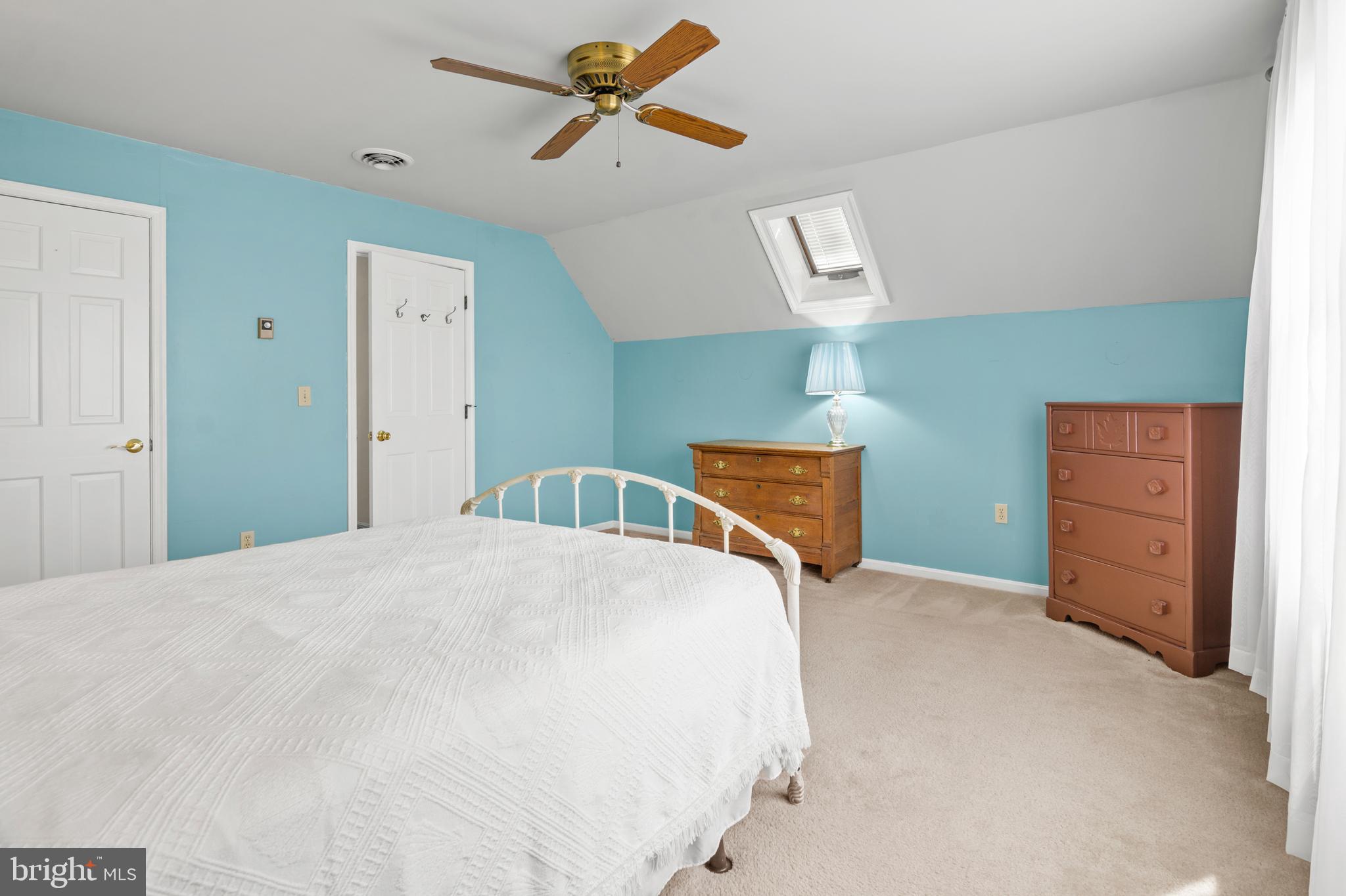 22539 Indian Point Road Bozman, MD 21612 - Photo 36 of 66 a bedroom with a bed and a dresser