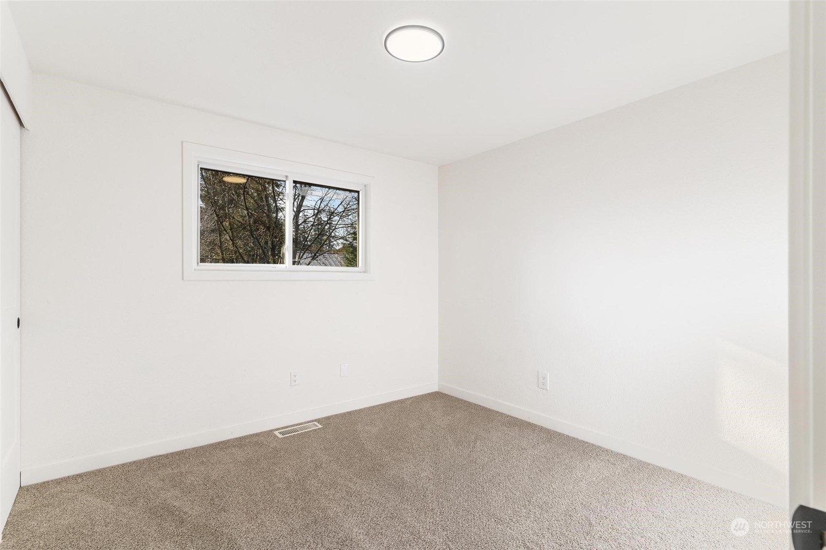 302 225th Street Southwest Bothell, WA 98021 - Photo 13 of 39 an empty room with windows