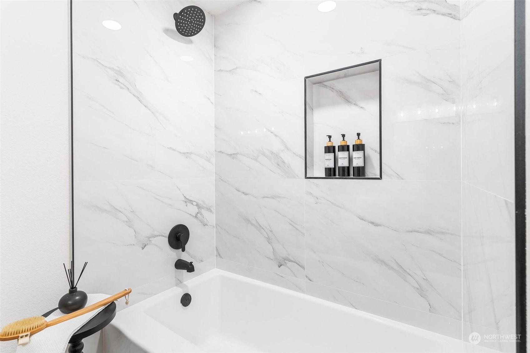 302 225th Street Southwest Bothell, WA 98021 - Photo 16 of 39 a bathroom with a tub sink and mirror