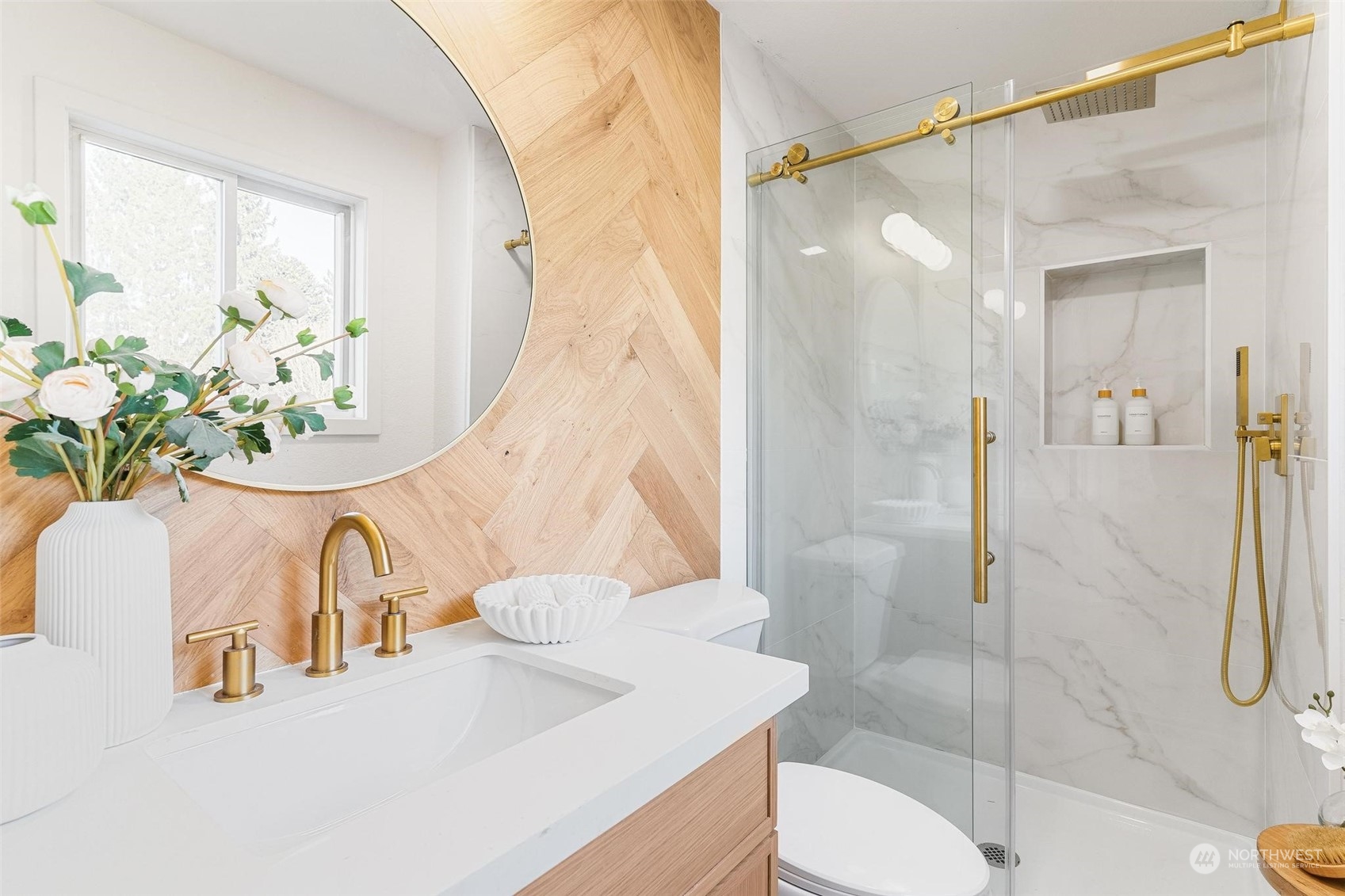 302 225th Street Southwest Bothell, WA 98021 - Photo 20 of 39 a bathroom with a sink a toilet and shower