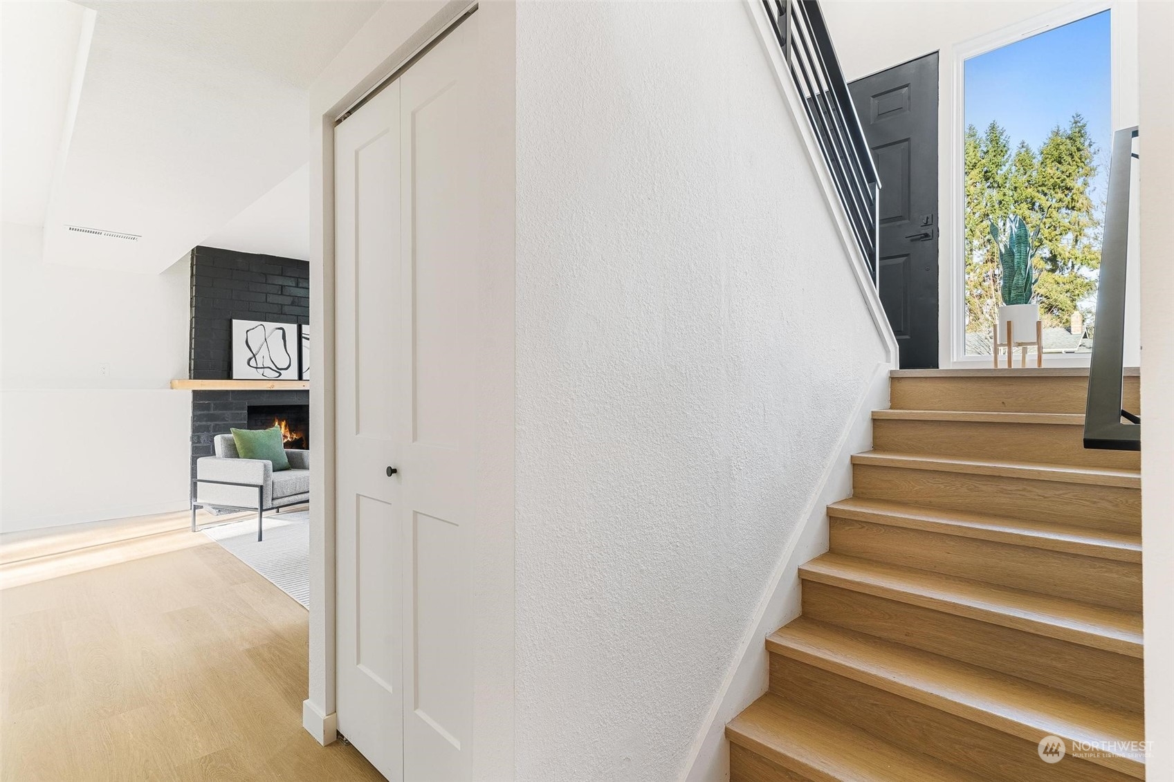 302 225th Street Southwest Bothell, WA 98021 - Photo 22 of 39 a view of entryway with wooden floor and stairs