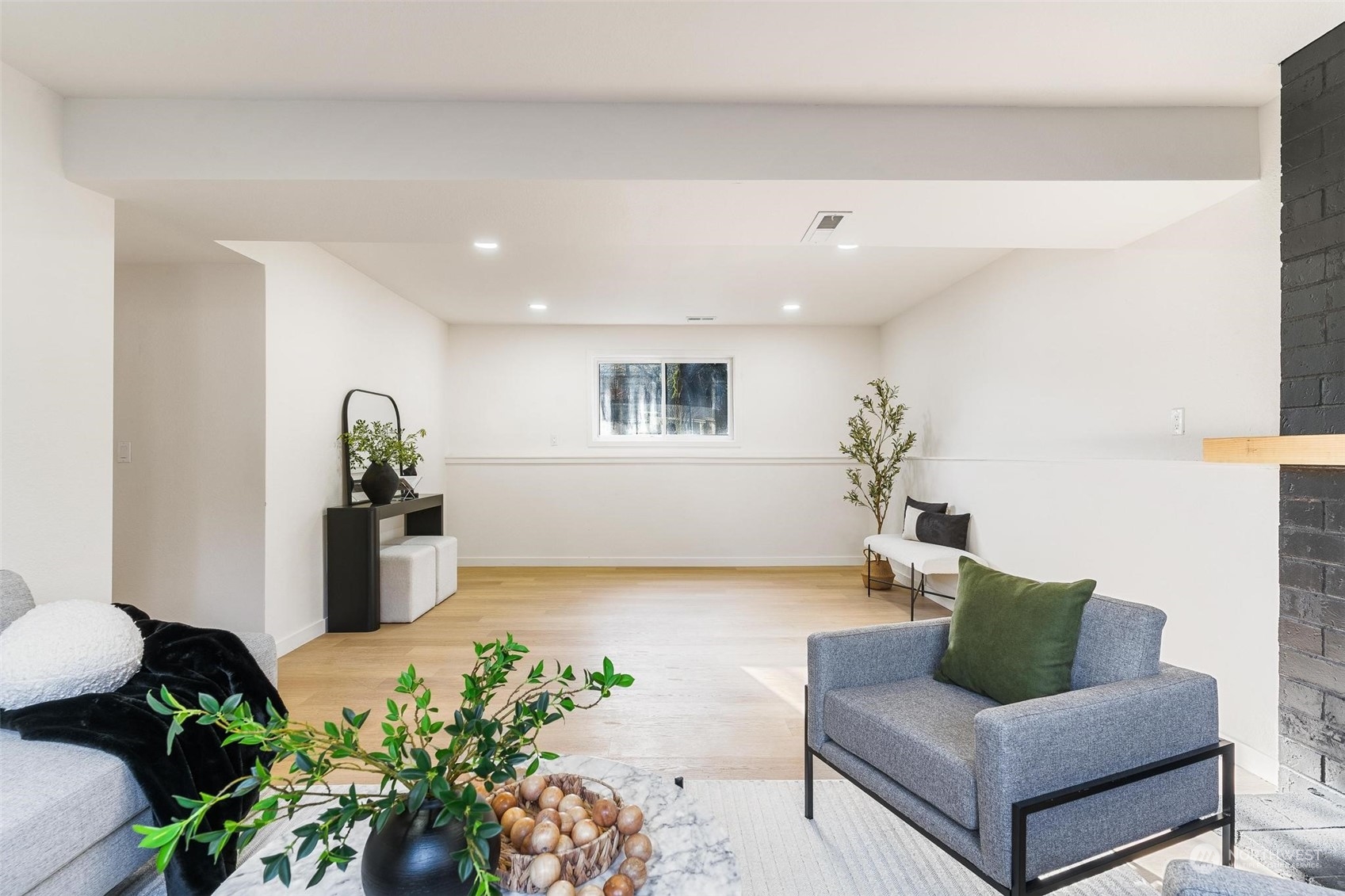 302 225th Street Southwest Bothell, WA 98021 - Photo 25 of 39 a living room with furniture and a potted plant