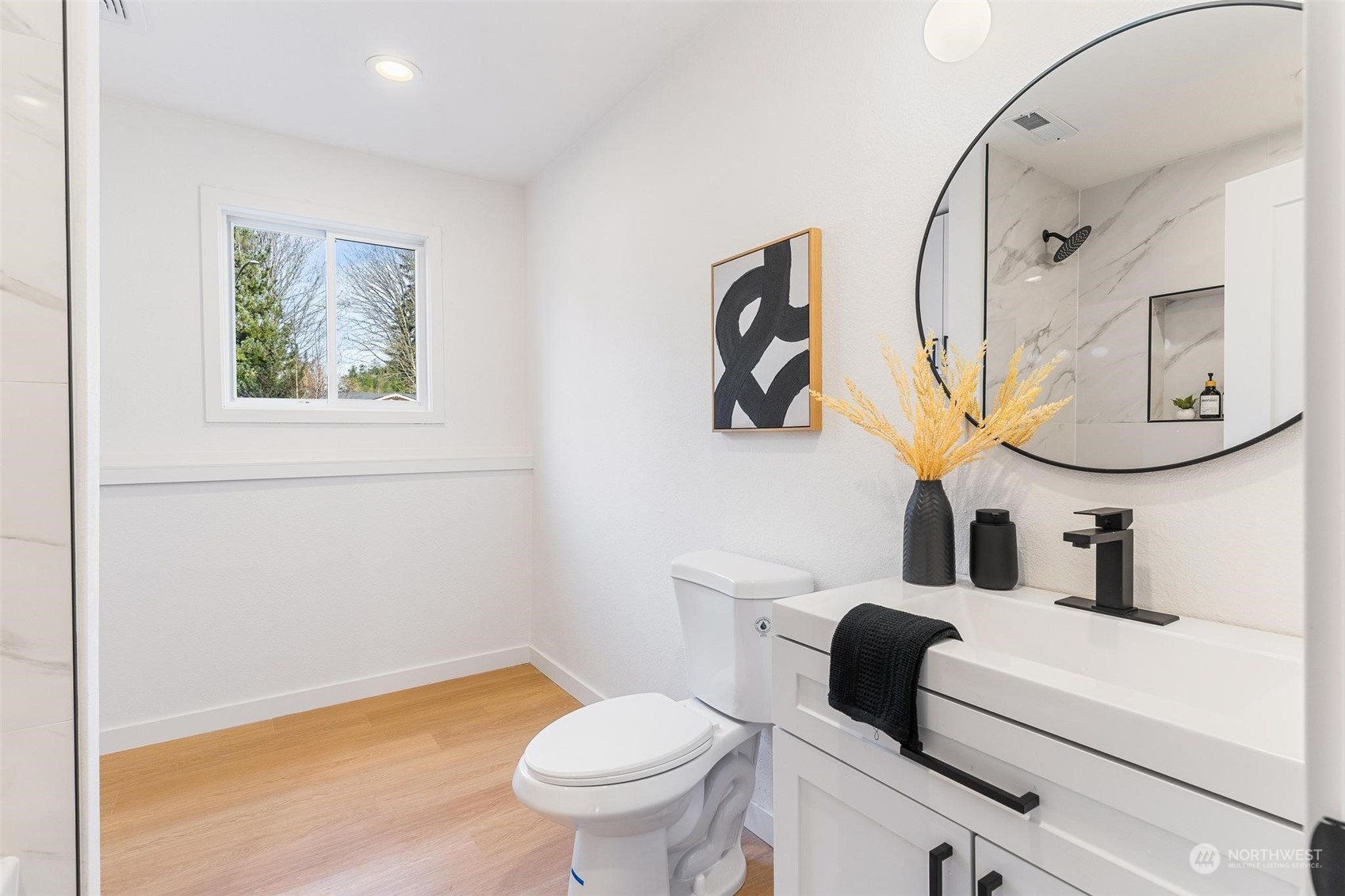 302 225th Street Southwest Bothell, WA 98021 - Photo 28 of 39 a bathroom with a toilet sink and mirror