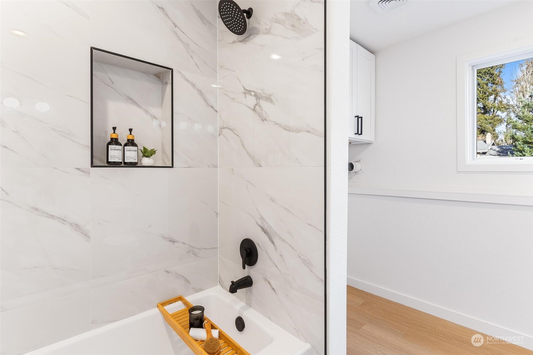 302 225th Street Southwest Bothell, WA 98021 - Photo 29 of 39 a bathroom with a bathtub and a shower