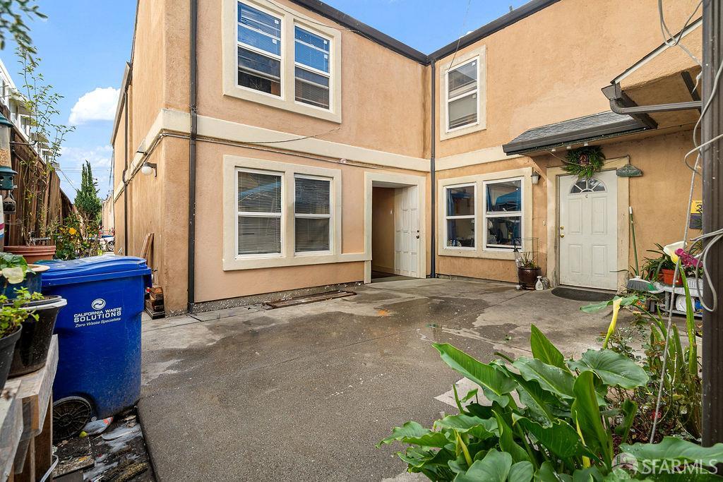 2825 High Street Oakland, CA 94619 - Photo 5 of 23 a backyard of a house with sofas