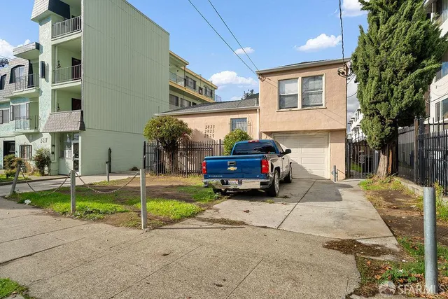a car parked in front of a house