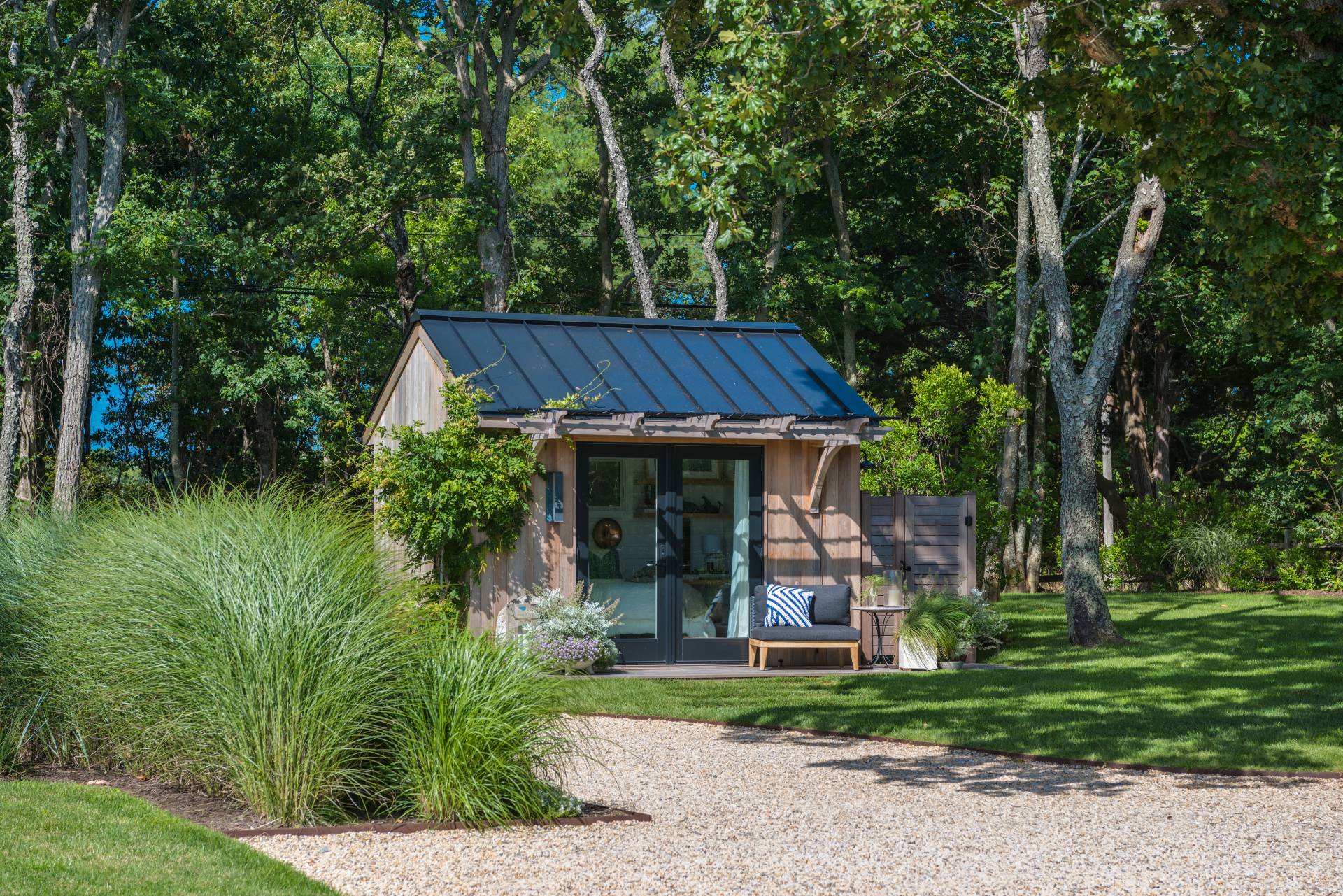 101 Gerard Drive East Hampton, NY 11937 - Photo 18 of 29 a view of a barn in the middle of a yard