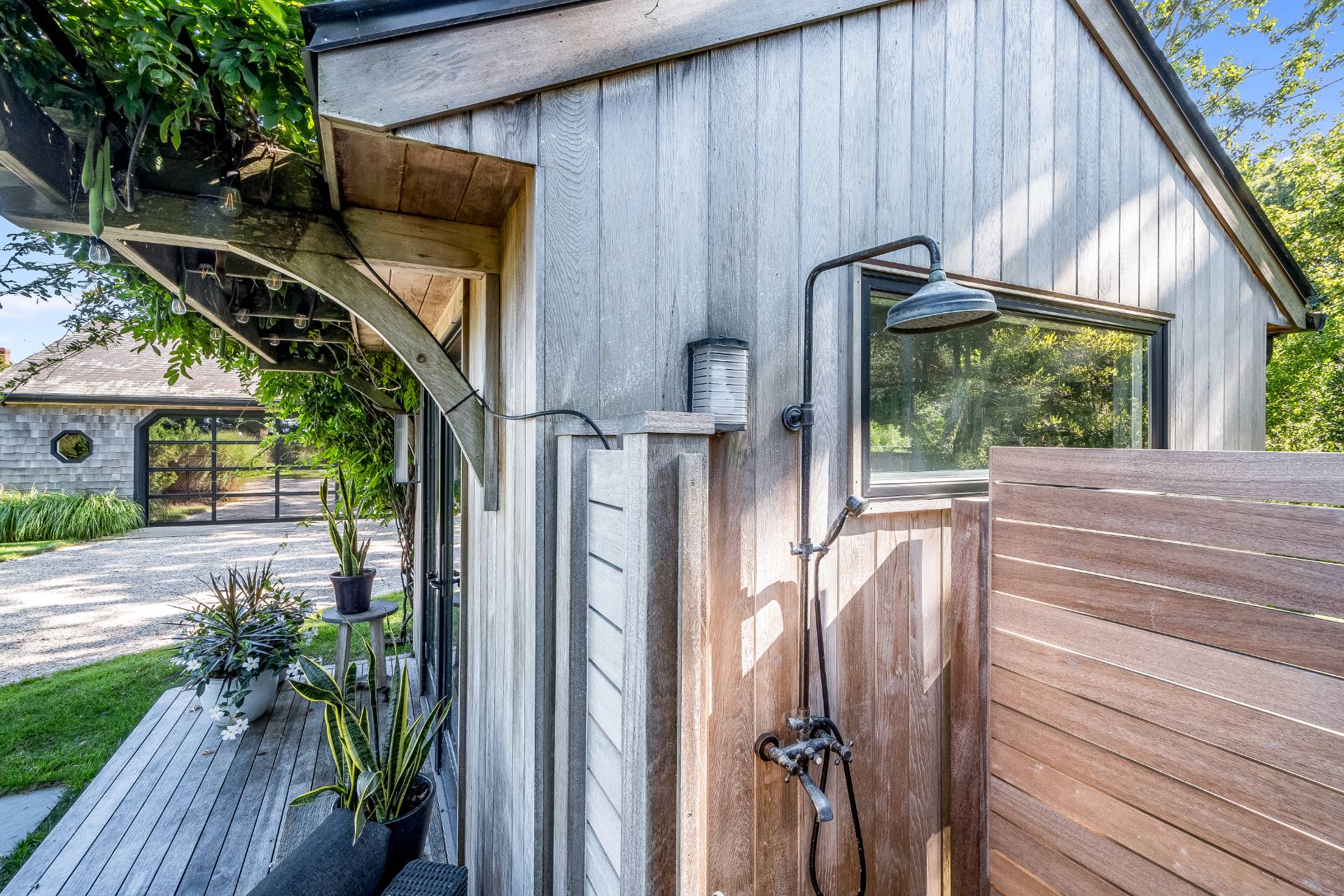 101 Gerard Drive East Hampton, NY 11937 - Photo 21 of 29 a view of balcony with furniture and garden