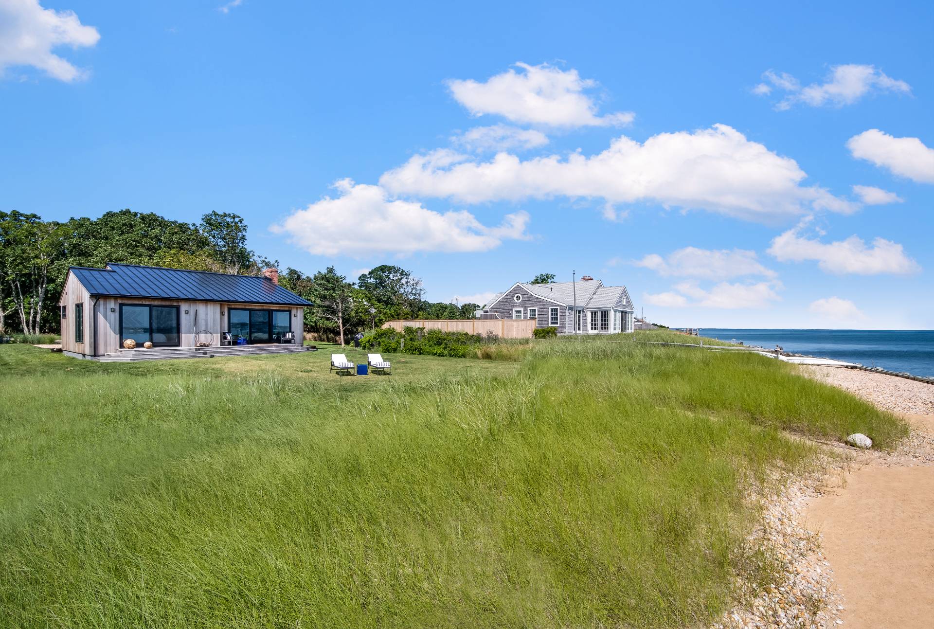 101 Gerard Drive East Hampton, NY 11937 - Photo 24 of 29 a view of a house with a backyard