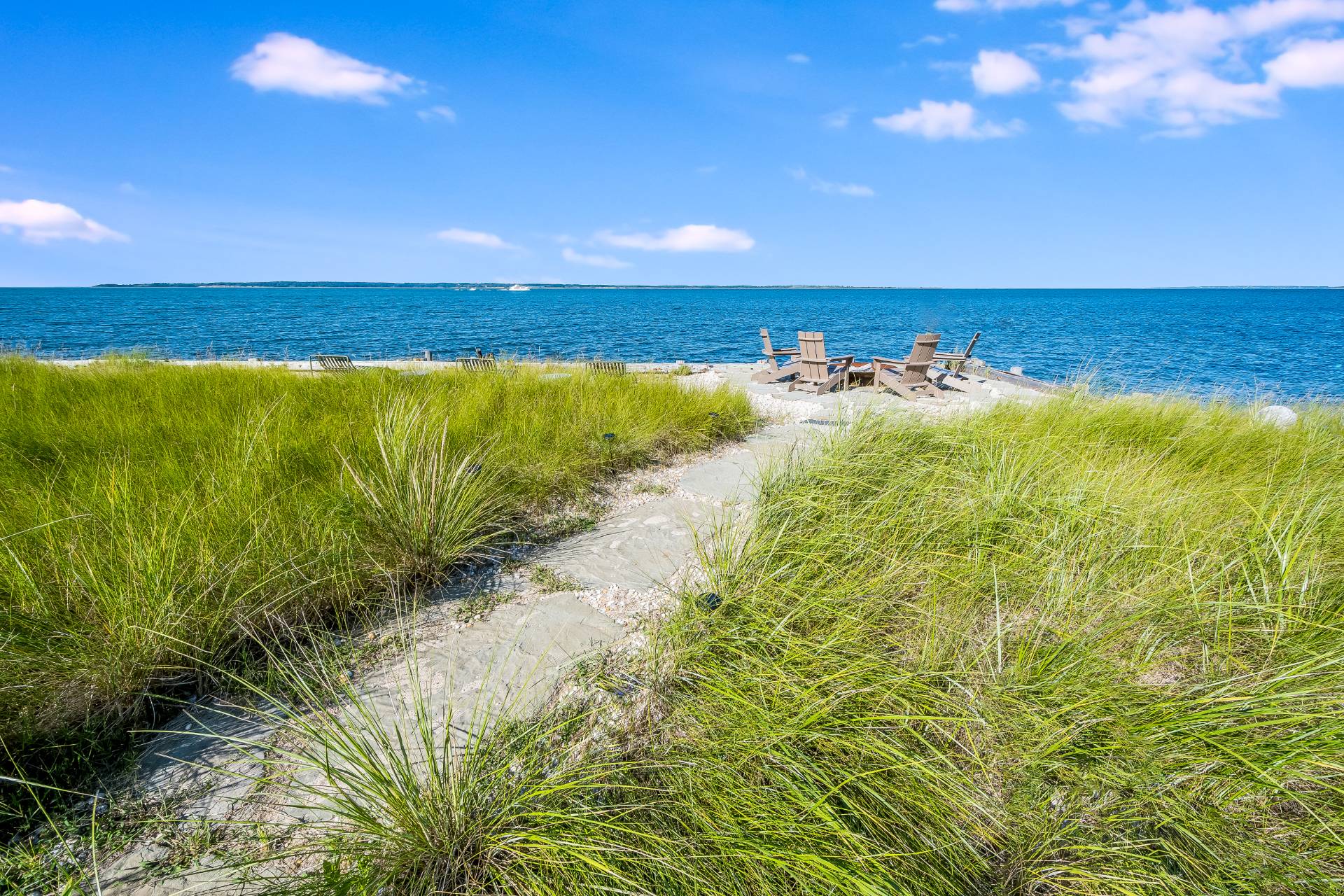 101 Gerard Drive East Hampton, NY 11937 - Photo 25 of 29 a view of an ocean and beach
