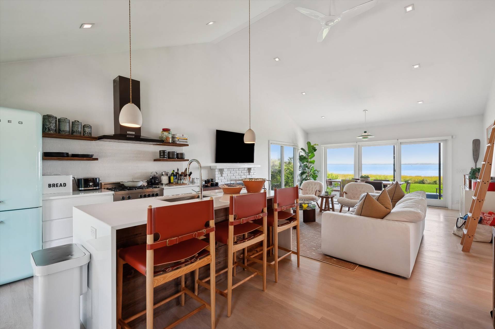 101 Gerard Drive East Hampton, NY 11937 - Photo 7 of 29 a view of a dining room with furniture window and wooden floor