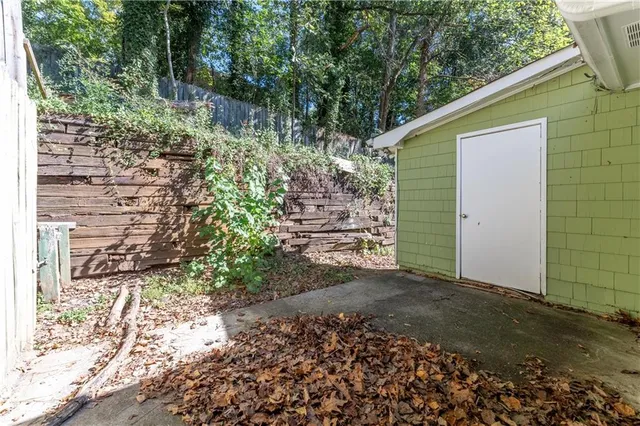 a backyard of a house with lots of green space