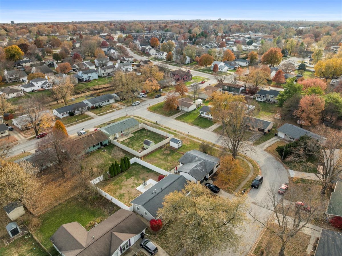1303 Dalton Drive Normal, IL 61761 - Photo 4 of 20 an aerial view of residential houses with outdoor space