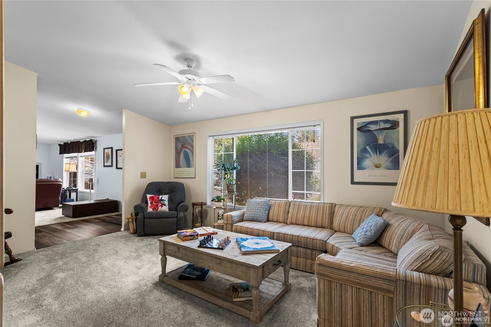 6719 241st Avenue East, Unit 46 Buckley, WA 98321 - Photo 15 of 35 a living room with furniture and a flat screen tv