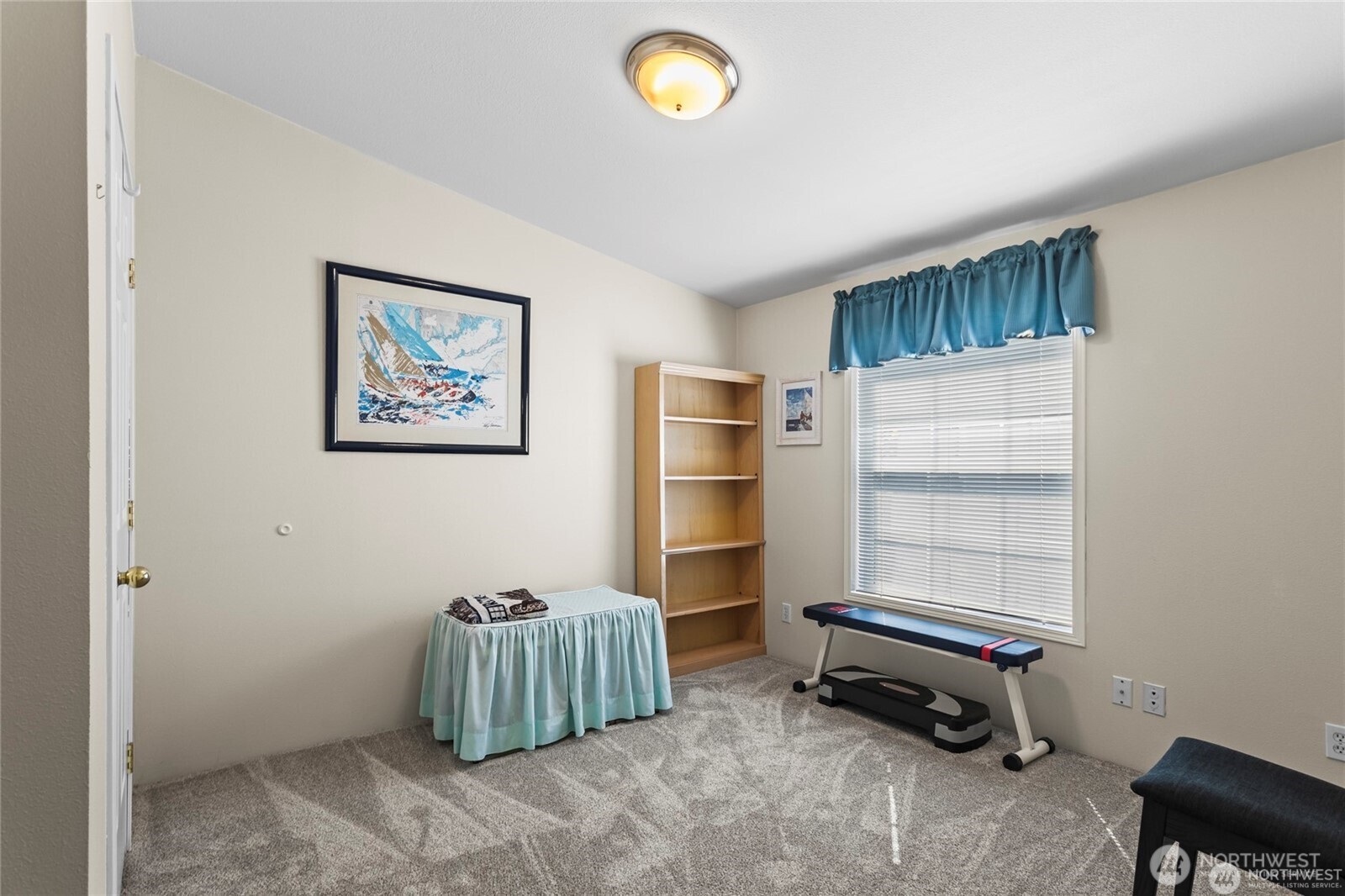 6719 241st Avenue East, Unit 46 Buckley, WA 98321 - Photo 21 of 35 a room with a desk and chair