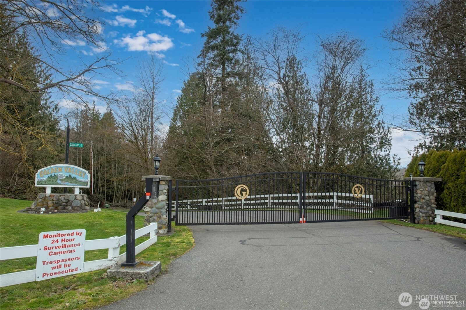 6719 241st Avenue East, Unit 46 Buckley, WA 98321 - Photo 34 of 35 a view of a park with swings and slides
