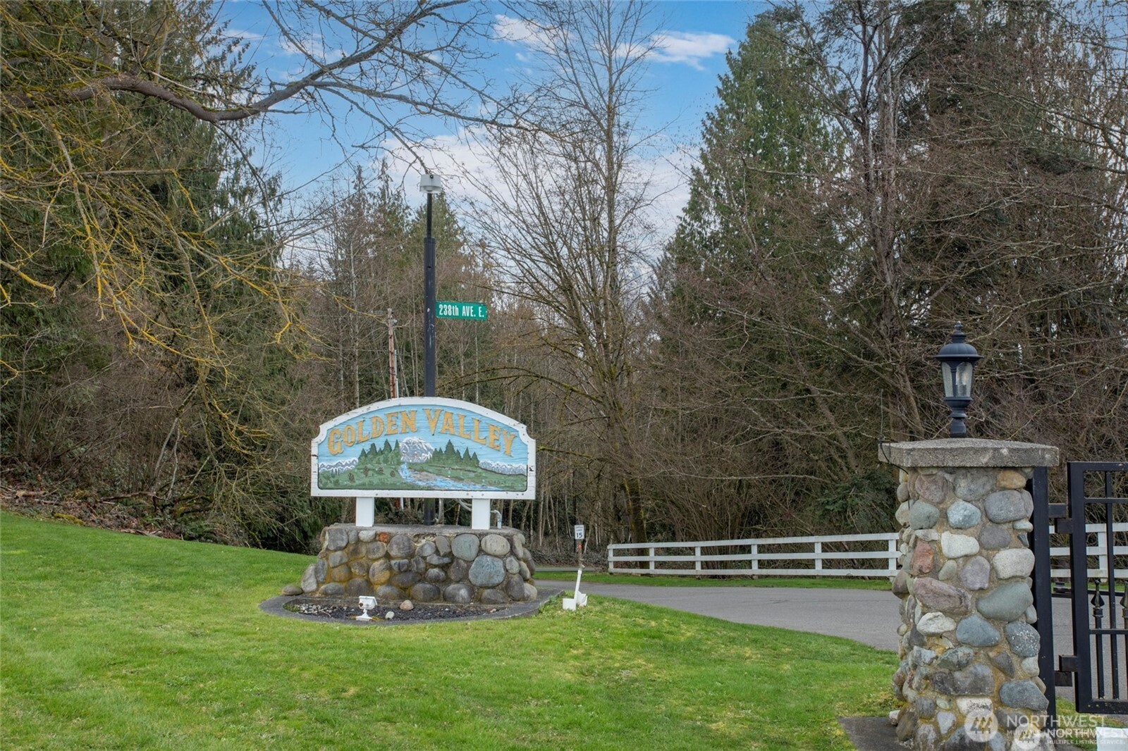 6719 241st Avenue East, Unit 46 Buckley, WA 98321 - Photo 35 of 35 a view of a bench in a garden