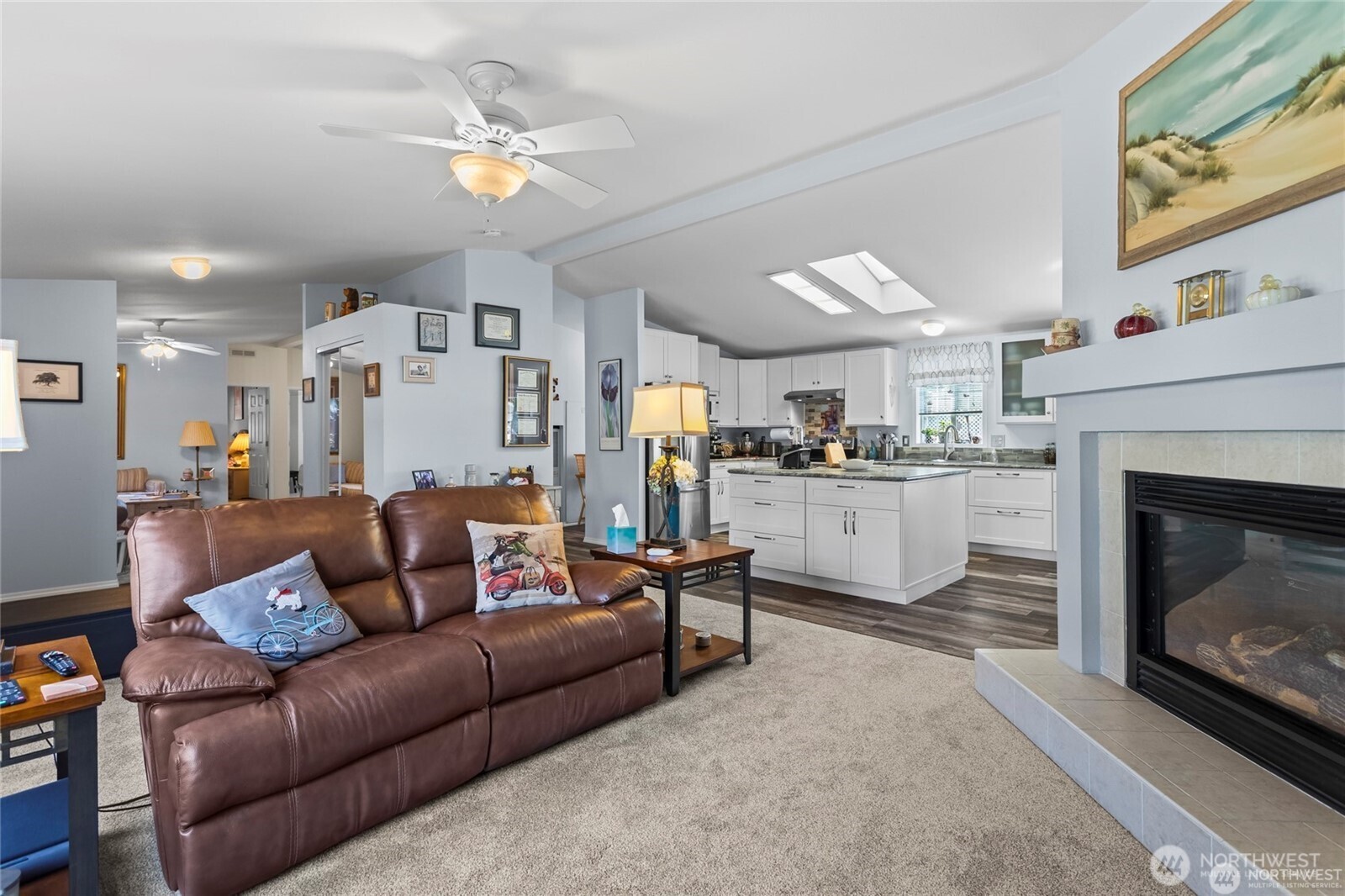 6719 241st Avenue East, Unit 46 Buckley, WA 98321 - Photo 10 of 35 a living room with furniture and kitchen view