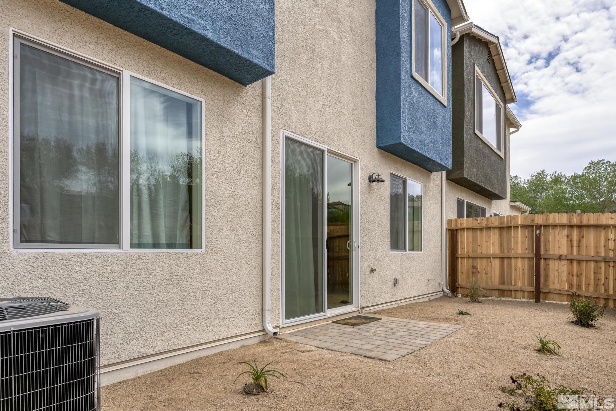 4920 Little Rock Way Sun Valley, NV 89433 - Photo 30 of 37 a backyard of a house