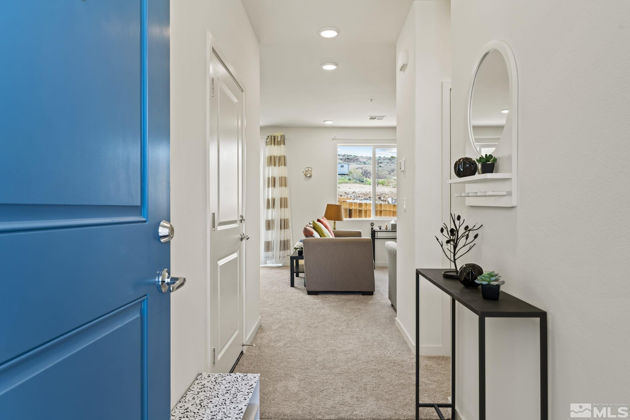 4920 Little Rock Way Sun Valley, NV 89433 - Photo 3 of 37 a view of living room with furniture and a potted plant