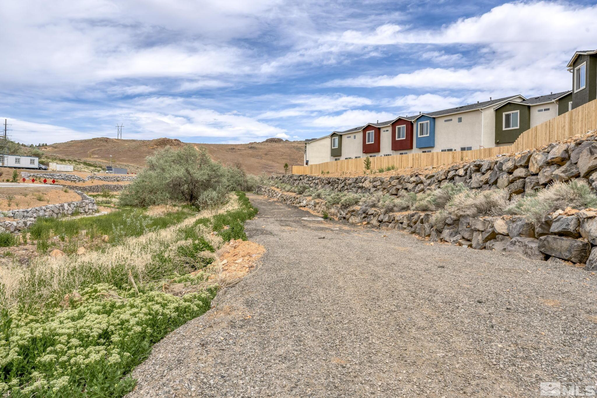 4920 Little Rock Way Sun Valley, NV 89433 - Photo 34 of 37 a view of a house with a yard